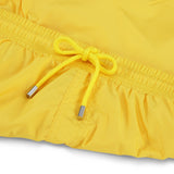 Yellow swim trunks