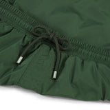 Green swim shorts