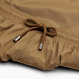 Beige swim trunks